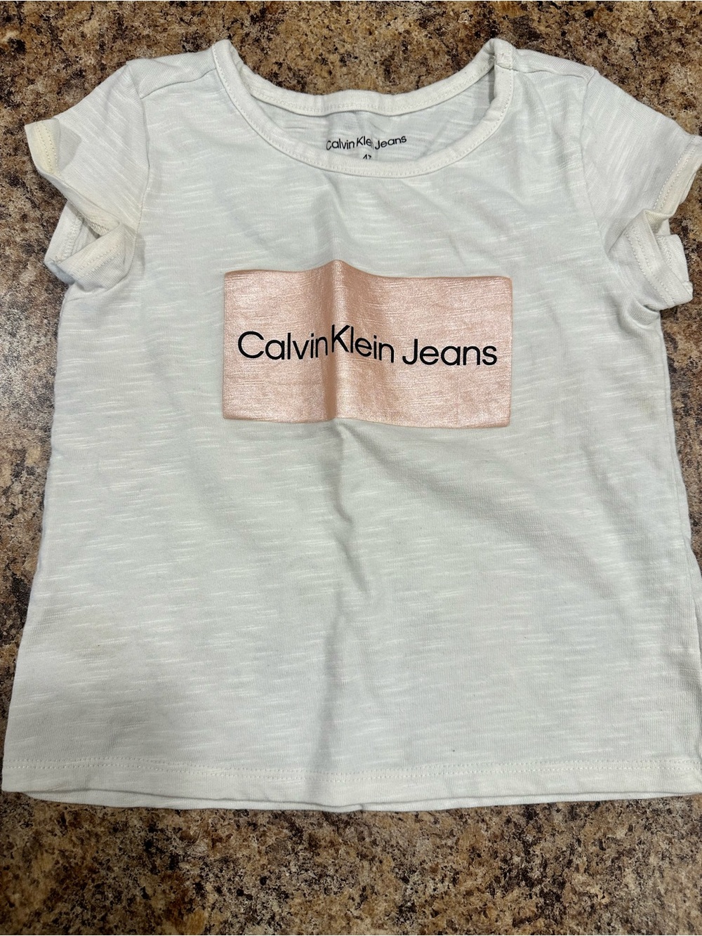 Girls 4t Calvin Klein T-shirt with pink metallic logo on chest